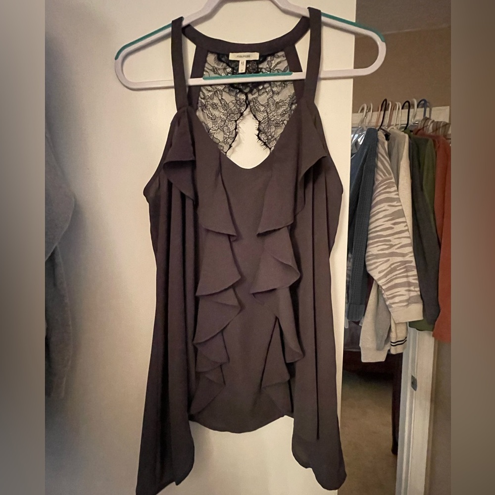 Dark grey sexy top with black lace back details. Size 0 but fits like a L.
